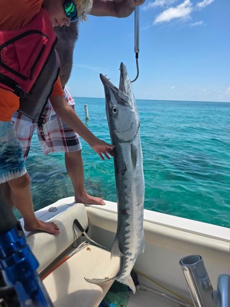 Catch photo from Outdoor Dog Supply: Gaffed in clear blue water